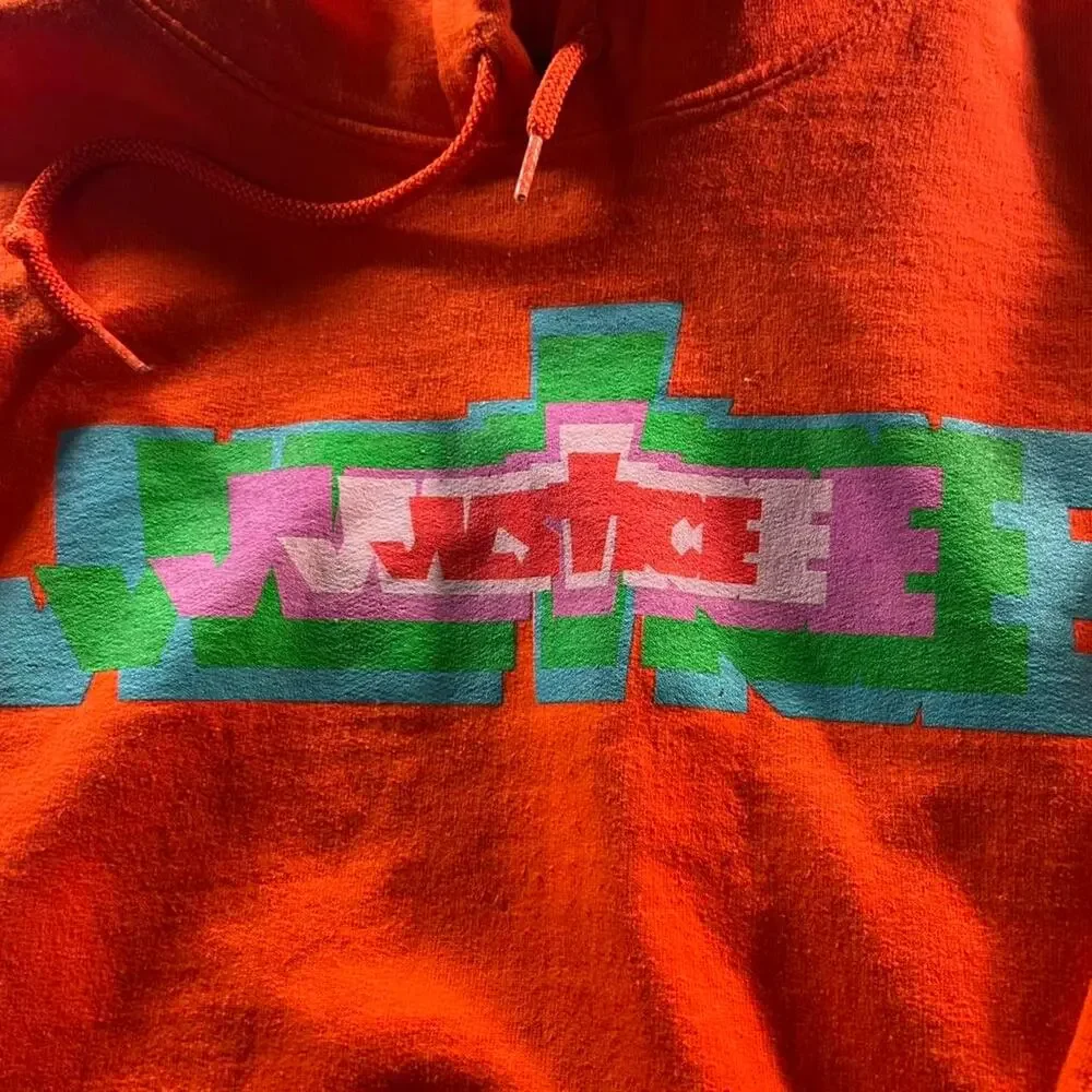 Justice orange hoodie with multicoloured design Size L